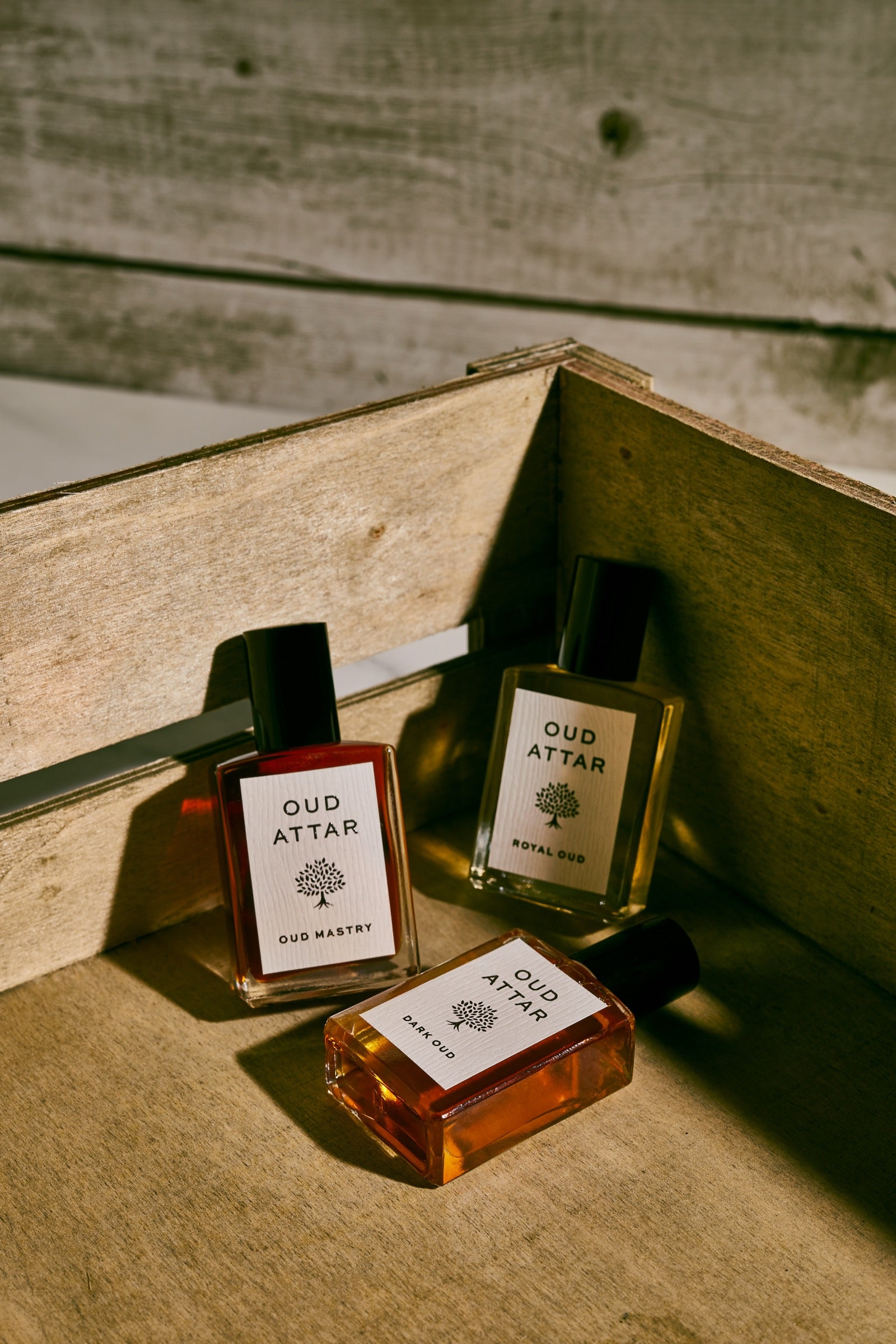 Oud Attar perfume oils in a wooden box