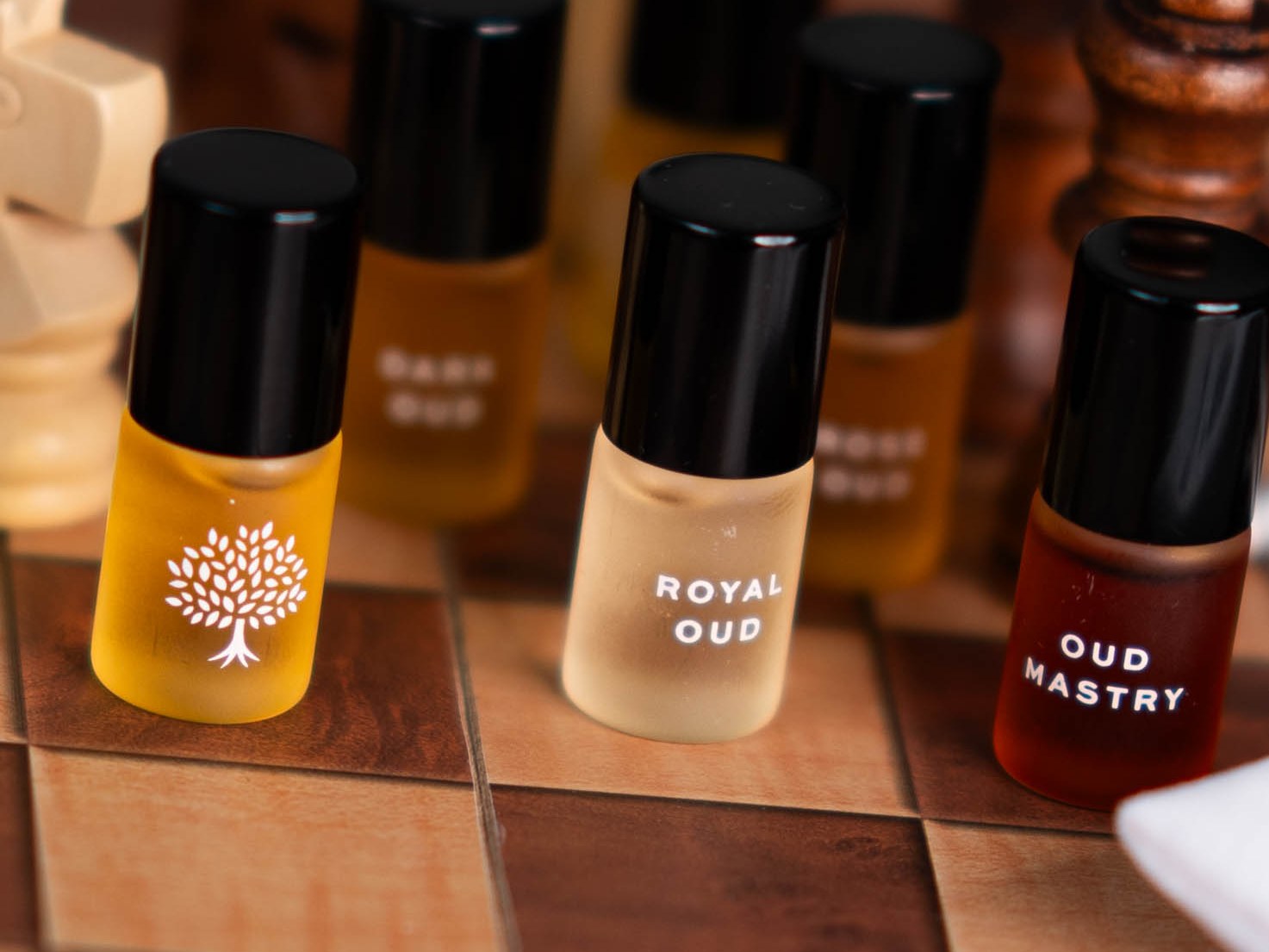 Oud rollerballs on a chessboard
