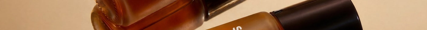 Oud Mastry and Sweet Oud rollerballs side by side